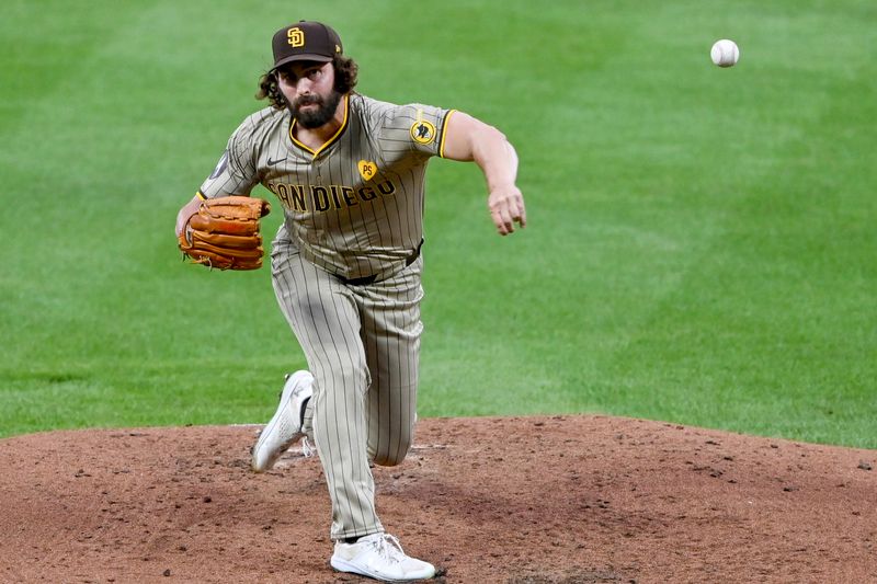 Jul 26, 2024; Baltimore, Maryland, USA;  San Diego Padres pitcher Austin Davis throws a third  inning pitch against the Baltimore Orioles at Oriole Park at Camden Yards. Mandatory Credit: Tommy Gilligan-USA TODAY Sports