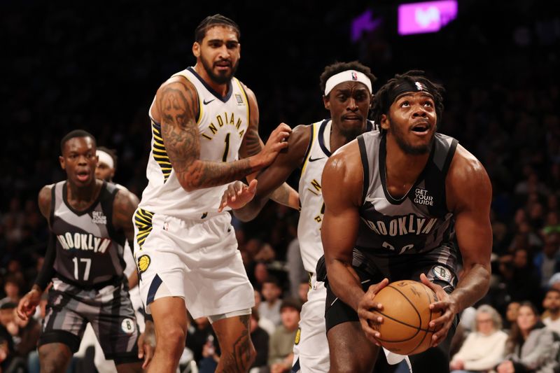 NEW YORK, NEW YORK - DECEMBER 04: Day'Ron Sharpe #20 of the Brooklyn Nets goes to the basket during the second half against the Indiana Pacers at Barclays Center on December 04, 2024 in the Brooklyn borough of New York City. The Nets won 99-90. NOTE TO USER: User expressly acknowledges and agrees that, by downloading and or using this photograph, User is consenting to the terms and conditions of the Getty Images License Agreement. (Photo by Sarah Stier/Getty Images)