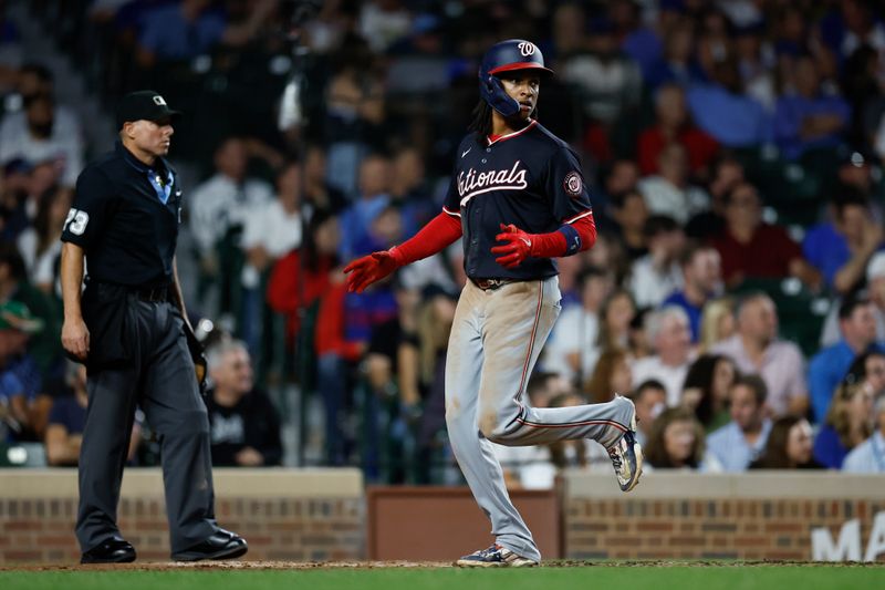 Sep 19, 2024; Chicago, Illinois, USA; Washington Nationals shortstop CJ Abrams (5) scores against the Chicago Cubs during the third inning at Wrigley Field. Mandatory Credit: Kamil Krzaczynski-Imagn Images