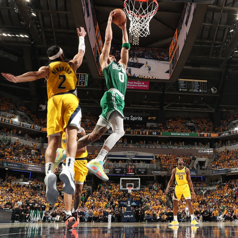 INDIANAPOLIS, IN - MAY 27: Jayson Tatum #0 of the Boston Celtics drives to the basket during the game against the Indiana Pacers during Game 4 of the Eastern Conference Finals of the 2024 NBA Playoffs on May 27, 2024 at Gainbridge Fieldhouse in Indianapolis, Indiana. NOTE TO USER: User expressly acknowledges and agrees that, by downloading and or using this Photograph, user is consenting to the terms and conditions of the Getty Images License Agreement. Mandatory Copyright Notice: Copyright 2024 NBAE (Photo by Nathaniel S. Butler/NBAE via Getty Images)