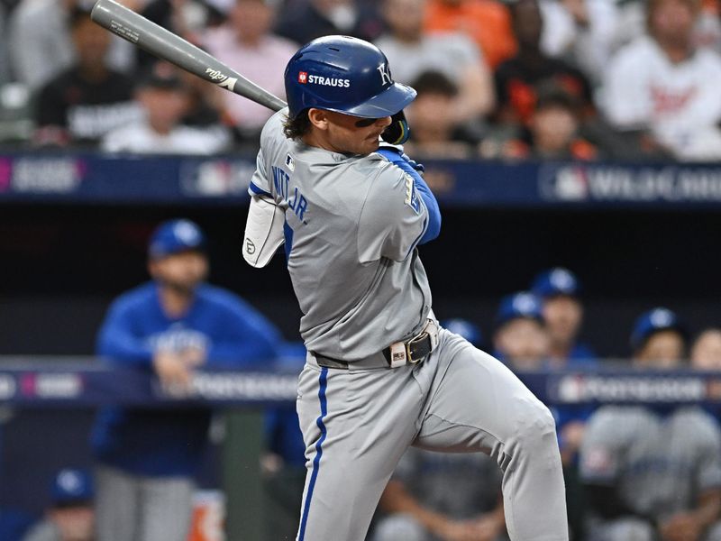 Oct 1, 2024; Baltimore, Maryland, USA; Kansas City Royals shortstop Bobby Witt Jr. (7) hits a RBI single at bat in the sixth inning in game one of the Wild Card round for the 2024 MLB Playoffs at Oriole Park at Camden Yards. Mandatory Credit: Tommy Gilligan-Imagn Images