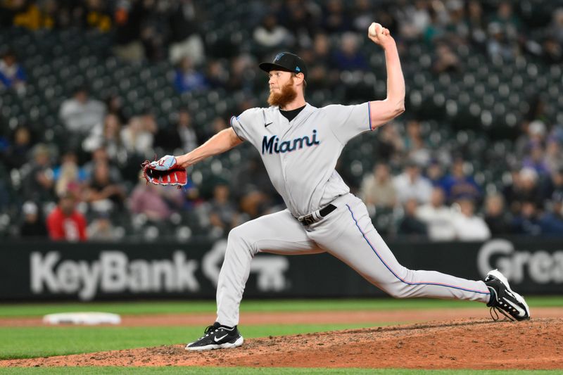 Jun 14, 2023; Seattle, Washington, USA; Miami Marlins relief pitcher A.J. Puk (35) pitches to the Seattle Mariners during the ninth inning at T-Mobile Park. Mandatory Credit: Steven Bisig-USA TODAY Sports