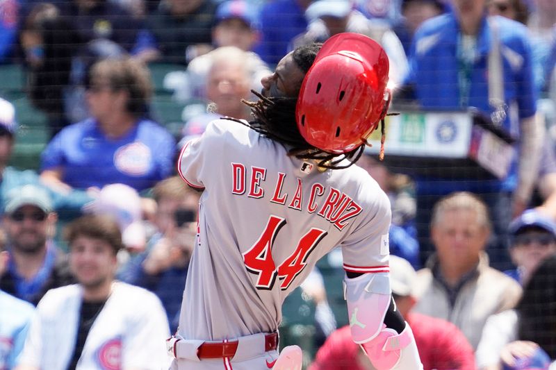 Jun 1, 2025; Chicago, Illinois, USA; Cincinnati Reds shortstop Elly De La Cruz (44) swings and loses his helmet against the Chicago Cubs during the first inning at Wrigley Field. Mandatory Credit: David Banks-Imagn Images