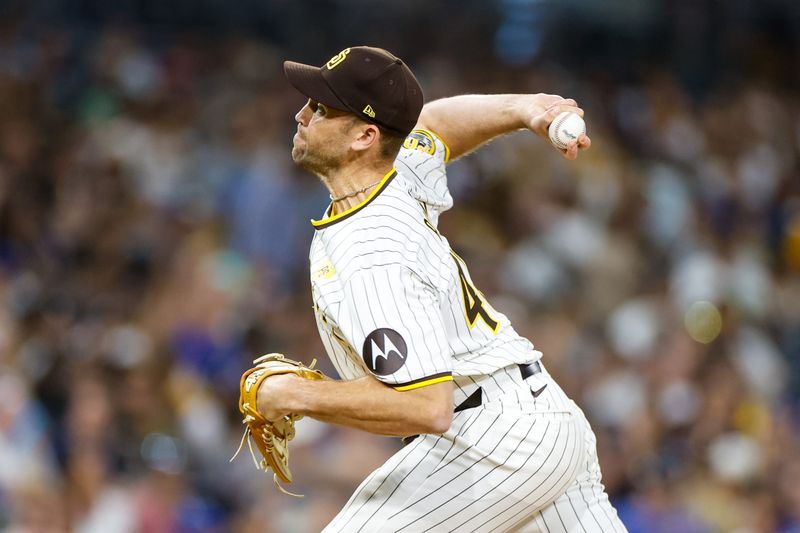 Jul 31, 2024; San Diego, California, USA; San Diego Padres relief pitcher Jason Adam (40) pitches during the eighth inning against the Los Angeles Dodgers at Petco Park. Mandatory Credit: David Frerker-USA TODAY Sports