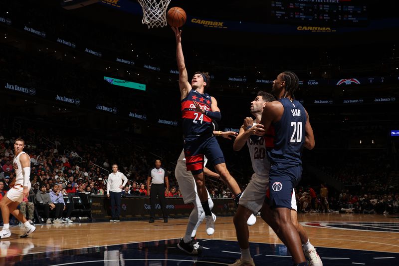 WASHINGTON, DC -? OCTOBER 26: Corey Kispert #24 of the Washington Wizards drives to the basket during the game against the Cleveland Cavaliers on October 26, 2024 at Capital One Arena in Washington, DC. NOTE TO USER: User expressly acknowledges and agrees that, by downloading and or using this Photograph, user is consenting to the terms and conditions of the Getty Images License Agreement. Mandatory Copyright Notice: Copyright 2024 NBAE (Photo by Stephen Gosling/NBAE via Getty Images)