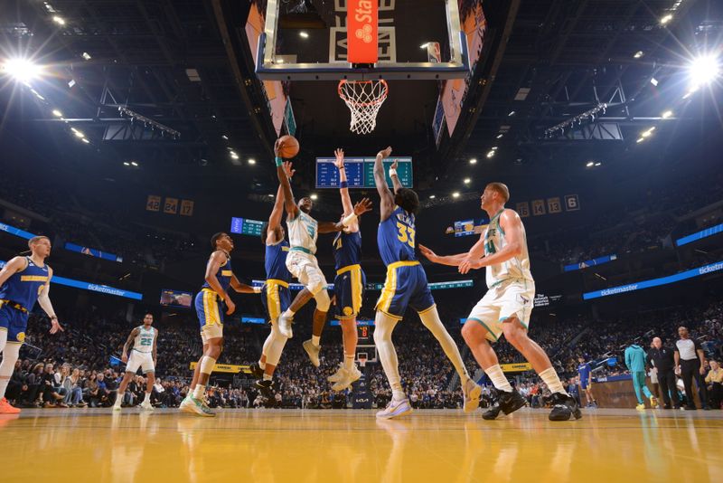 SAN FRANCISCO, CA - DECEMBER 27: Terry Rozier #3 of the Charlotte Hornets drives to the basket during the game against the Golden State Warriors on December 27, 2022 at Chase Center in San Francisco, California. NOTE TO USER: User expressly acknowledges and agrees that, by downloading and or using this photograph, user is consenting to the terms and conditions of Getty Images License Agreement. Mandatory Copyright Notice: Copyright 2022 NBAE (Photo by Noah Graham/NBAE via Getty Images)