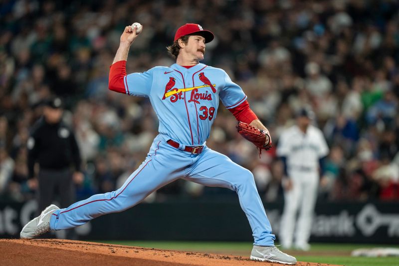 Apr 22, 2023; Seattle, Washington, USA; St. Louis Cardinals starter Miles Mikolas (39) delivers a pitch during the first inning against the Seattle Mariners at T-Mobile Park. Mandatory Credit: Stephen Brashear-USA TODAY Sports