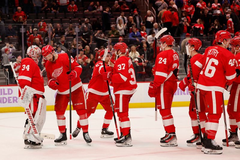 Nov 30, 2023; Detroit, Michigan, USA; Detroit Red Wings celebrate after the game against the Chicago Blackhawks at Little Caesars Arena. Mandatory Credit: Rick Osentoski-USA TODAY Sports