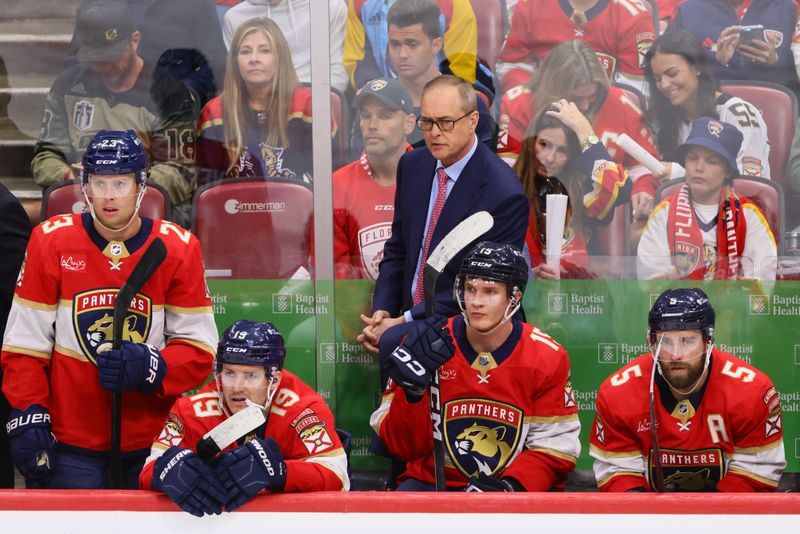 Apr 21, 2024; Sunrise, Florida, USA; Florida Panthers head coach Paul Maurice looks on from the bench against the Tampa Bay Lightning during the third period in game one of the first round of the 2024 Stanley Cup Playoffs at Amerant Bank Arena. Mandatory Credit: Sam Navarro-USA TODAY Sports