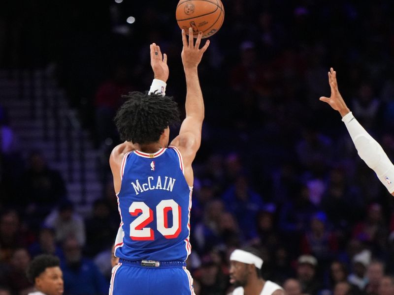 PHILADELPHIA, PA - NOVEMBER 13: Jared McCain #20 of the Philadelphia 76ers shoots the ball during the game against the Cleveland Cavaliers on November 13, 2024 at the Wells Fargo Center in Philadelphia, Pennsylvania NOTE TO USER: User expressly acknowledges and agrees that, by downloading and/or using this Photograph, user is consenting to the terms and conditions of the Getty Images License Agreement. Mandatory Copyright Notice: Copyright 2024 NBAE (Photo by Jesse D. Garrabrant/NBAE via Getty Images)