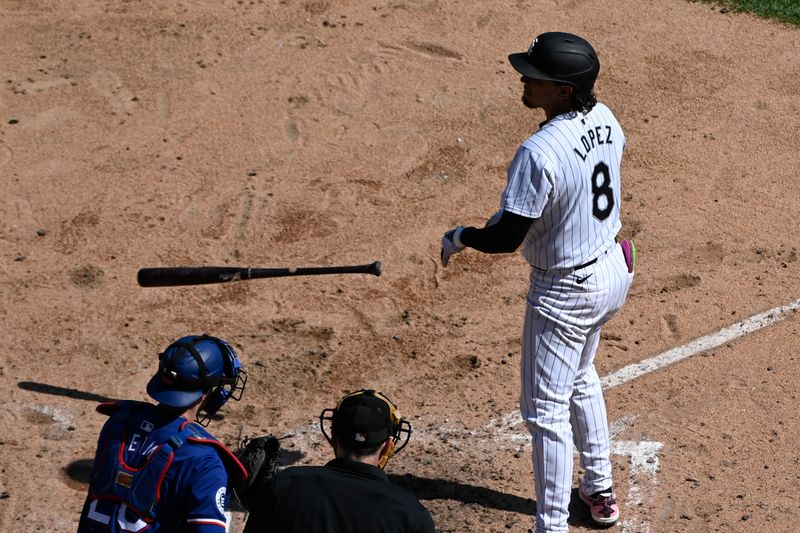 Aug 29, 2024; Chicago, Illinois, USA;  Chicago White Sox second base Nicky Lopez (8) throws his bat after he strikes out swinging against the Texas Rangers during the sixth inning at Guaranteed Rate Field. Mandatory Credit: Matt Marton-USA TODAY Sports