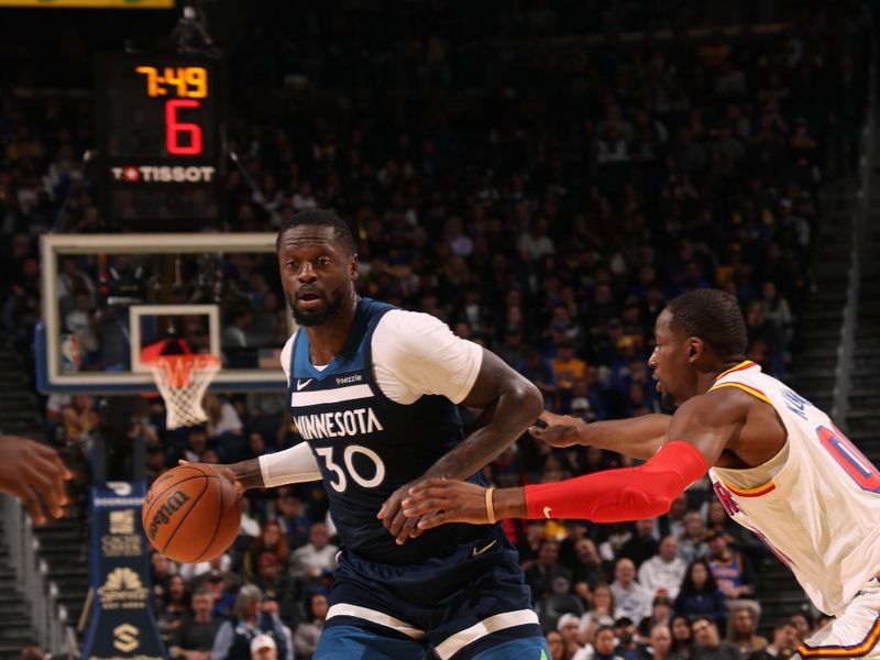 SAN FRANCISCO, CA - DECEMBER 8: Julius Randle #30 of the Minnesota Timberwolves dribbles the ball during the game against the Golden State Warriors on October 22, 2024 at Chase Center in San Francisco, California. NOTE TO USER: User expressly acknowledges and agrees that, by downloading and or using this photograph, user is consenting to the terms and conditions of Getty Images License Agreement. Mandatory Copyright Notice: Copyright 2024 NBAE (Photo by Jed Jacobsohn/NBAE via Getty Images)