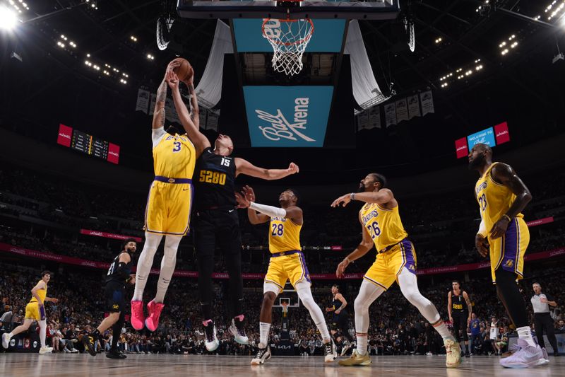 DENVER, CO - APRRIL 22: Anthony Davis #3 of the Los Angeles Lakers grabs a rebound during the game against the Denver Nuggets during Round 1 Game 2 of the 2024 NBA Playoffs on April 22, 2024 at the Ball Arena in Denver, Colorado. NOTE TO USER: User expressly acknowledges and agrees that, by downloading and/or using this Photograph, user is consenting to the terms and conditions of the Getty Images License Agreement. Mandatory Copyright Notice: Copyright 2024 NBAE (Photo by Garrett Ellwood/NBAE via Getty Images)