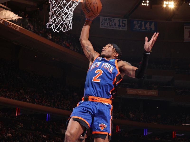 NEW YORK, NY - JANUARY 27: Miles McBride #2 of the New York Knicks dunks the ball during the game against the Miami Heat on January 27, 2024 at Madison Square Garden in New York City, New York.  NOTE TO USER: User expressly acknowledges and agrees that, by downloading and or using this photograph, User is consenting to the terms and conditions of the Getty Images License Agreement. Mandatory Copyright Notice: Copyright 2024 NBAE  (Photo by Nathaniel S. Butler/NBAE via Getty Images)