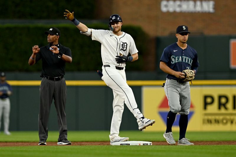 Aug 13, 2024; Detroit, Michigan, USA;  Detroit Tigers center fielder Parker Meadows (22) celebrates at second base after hitting a double against the Seattle Mariners in the sixth inning at Comerica Park. Mandatory Credit: Lon Horwedel-USA TODAY Sports