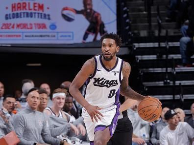 SACRAMENTO, CA - NOVEMBER 13: Malik Monk #0 of the Sacramento Kings brings the ball up court against the Cleveland Cavaliers on November 13, 2023 at Golden 1 Center in Sacramento, California. NOTE TO USER: User expressly acknowledges and agrees that, by downloading and or using this Photograph, user is consenting to the terms and conditions of the Getty Images License Agreement. Mandatory Copyright Notice: Copyright 2023 NBAE (Photo by Rocky Widner/NBAE via Getty Images)