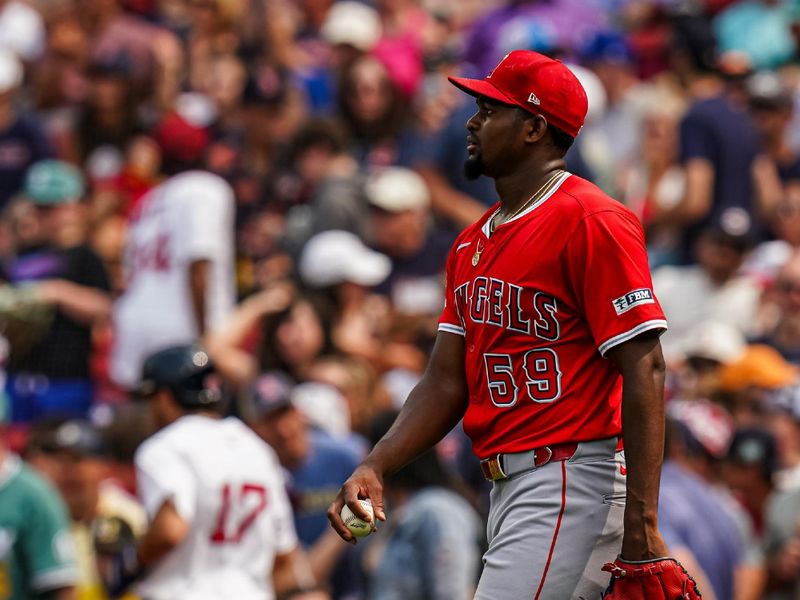 Jun 4, 2025; Boston, Massachusetts, USA; Los Angeles Angels pitcher José Soriano (59) looks on as Boston Red Sox shortstop David Hamilton (17) scores in the fourth inning at Fenway Park. Mandatory Credit: David Butler II-Imagn Images