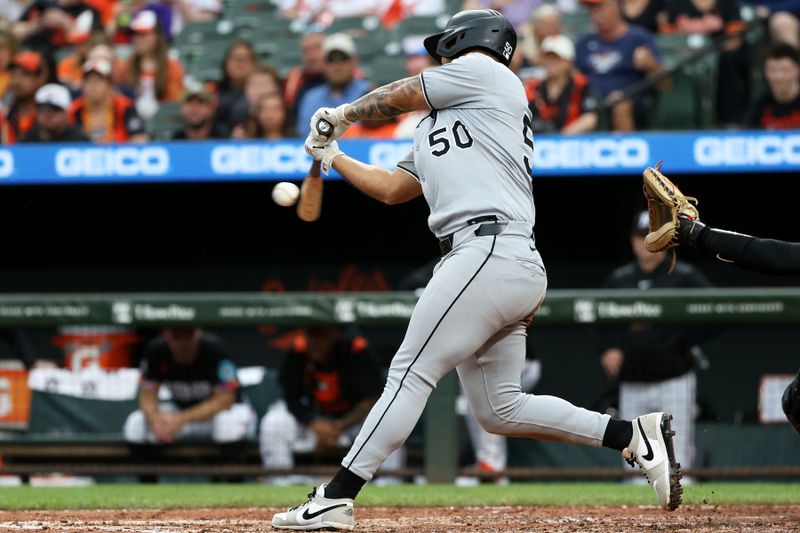May 30, 2025; Baltimore, Maryland, USA; Chicago White Sox second baseman Lenyn Sosa (50) hits a single during the sixth inning against the Baltimore Orioles at Oriole Park at Camden Yards. Mandatory Credit: Daniel Kucin Jr.-Imagn Images