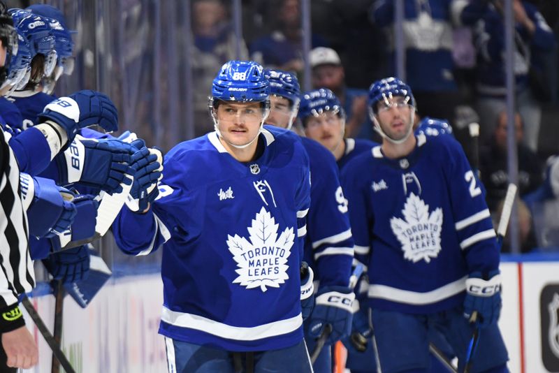 Oct 31, 2024; Toronto, Ontario, CAN;  Toronto Maple Leafs forward William Nylander (88) celebrates after scoring his second goal of the game against the Seattle Kraken in the second period at Scotiabank Arena. Mandatory Credit: Dan Hamilton-Imagn Images