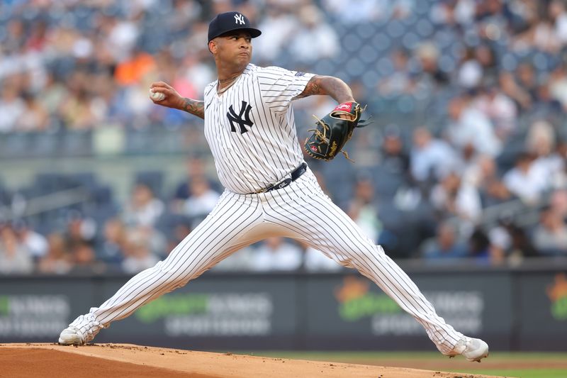 Jun 4, 2024; Bronx, New York, USA; New York Yankees starting pitcher Luis Gil (81) pitches against the Minnesota Twins during the first inning at Yankee Stadium. Mandatory Credit: Brad Penner-USA TODAY Sports