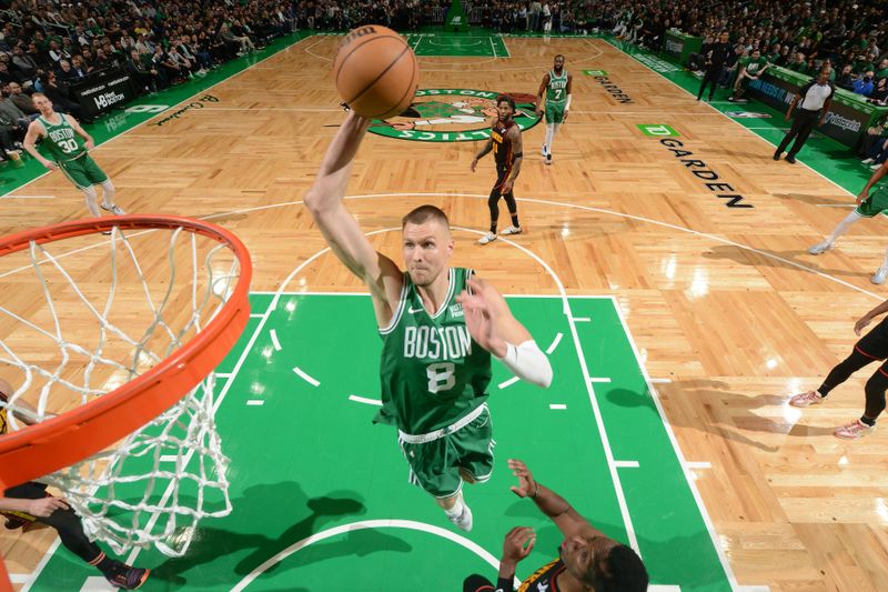 BOSTON, MA - FEBRUARY 7: Kristaps Porzingis #8 of the Boston Celtics drives to the basket during the game against the Atlanta Hawks on February 7, 2024 at the TD Garden in Boston, Massachusetts. NOTE TO USER: User expressly acknowledges and agrees that, by downloading and or using this photograph, User is consenting to the terms and conditions of the Getty Images License Agreement. Mandatory Copyright Notice: Copyright 2024 NBAE  (Photo by Brian Babineau/NBAE via Getty Images)