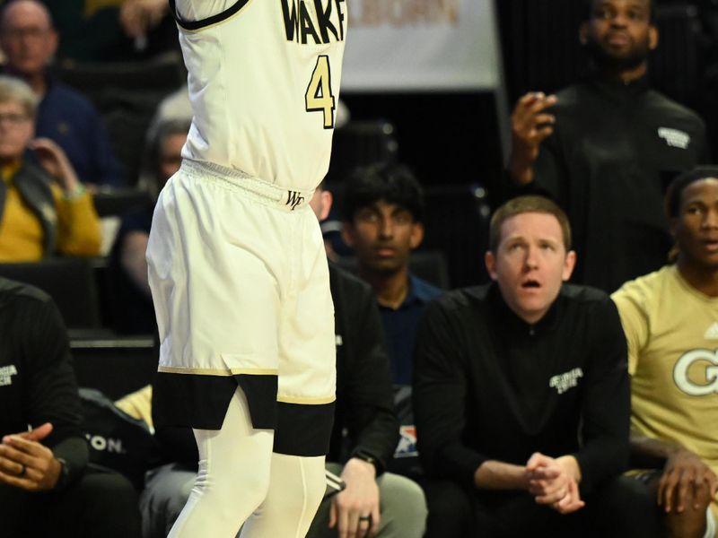 Feb 11, 2023; Winston-Salem, North Carolina, USA; Wake Forest Demon Deacons guard Daivien Williamson (4) takes a three during the first half at Lawrence Joel Veterans Memorial Coliseum. Mandatory Credit: William Howard-USA TODAY Sports