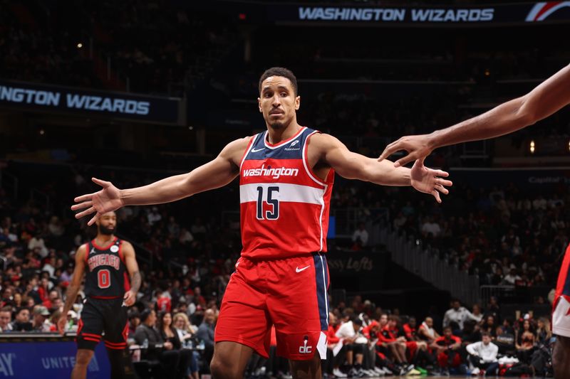 WASHINGTON, DC -? JANUARY 1: Malcolm Brogdon #15 of the Washington Wizards high fives teammates during the game against the Chicago Bulls on January 1, 2025 at Capital One Arena in Washington, DC. NOTE TO USER: User expressly acknowledges and agrees that, by downloading and or using this Photograph, user is consenting to the terms and conditions of the Getty Images License Agreement. Mandatory Copyright Notice: Copyright 2025 NBAE (Photo by Kenny Giarla/NBAE via Getty Images)