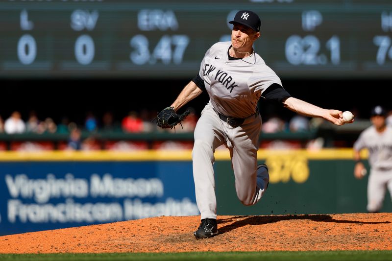 Sep 19, 2024; Seattle, Washington, USA; New York Yankees relief pitcher Tim Hill (54) throws against the Seattle Mariners during the sixth inning at T-Mobile Park. Mandatory Credit: Joe Nicholson-Imagn Images