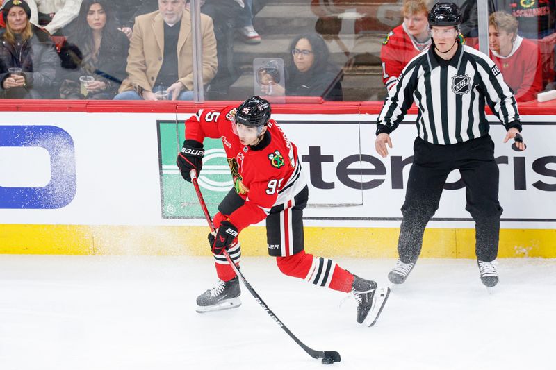 Jan 12, 2026; Chicago, Illinois, USA; Chicago Blackhawks right wing Ilya Mikheyev (95) shoots against the Edmonton Oilers during the first period at United Center. Mandatory Credit: Kamil Krzaczynski-Imagn Images