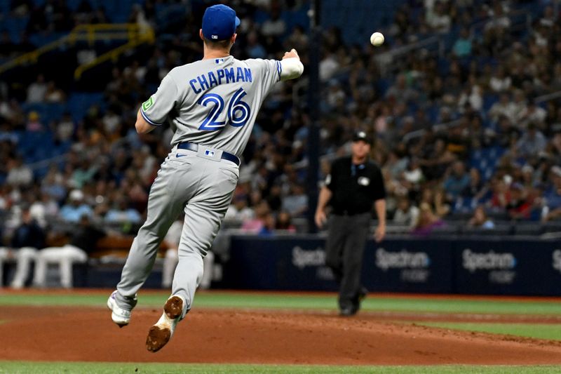 Sep 22, 2023; St. Petersburg, Florida, USA; Toronto Blue Jays third baseman Matt Chapman (26) throws to first base in the fifth inning against the Tampa Bay Rays  at Tropicana Field. Mandatory Credit: Jonathan Dyer-USA TODAY Sports