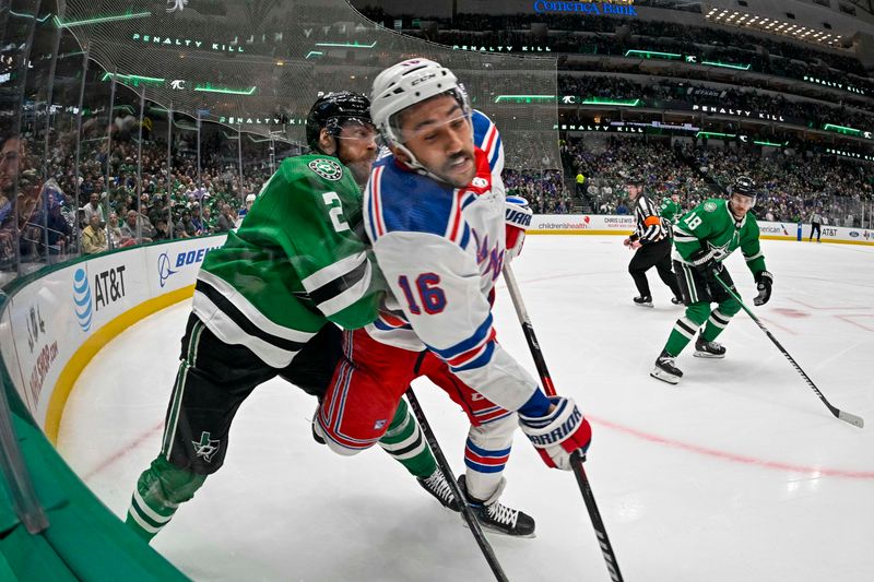 Nov 20, 2023; Dallas, Texas, USA; Dallas Stars defenseman Jani Hakanpaa (2) checks New York Rangers center Vincent Trocheck (16) during the first period at the American Airlines Center. Mandatory Credit: Jerome Miron-USA TODAY Sports