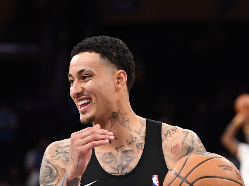 LOS ANGELES, CA - FEBRUARY 29: Kyle Kuzma #33 of the Washington Wizards smiles before the game against the Los Angeles Lakers on February 29, 2024 at Crypto.Com Arena in Los Angeles, California. NOTE TO USER: User expressly acknowledges and agrees that, by downloading and/or using this Photograph, user is consenting to the terms and conditions of the Getty Images License Agreement. Mandatory Copyright Notice: Copyright 2024 NBAE (Photo by Andrew D. Bernstein/NBAE via Getty Images)