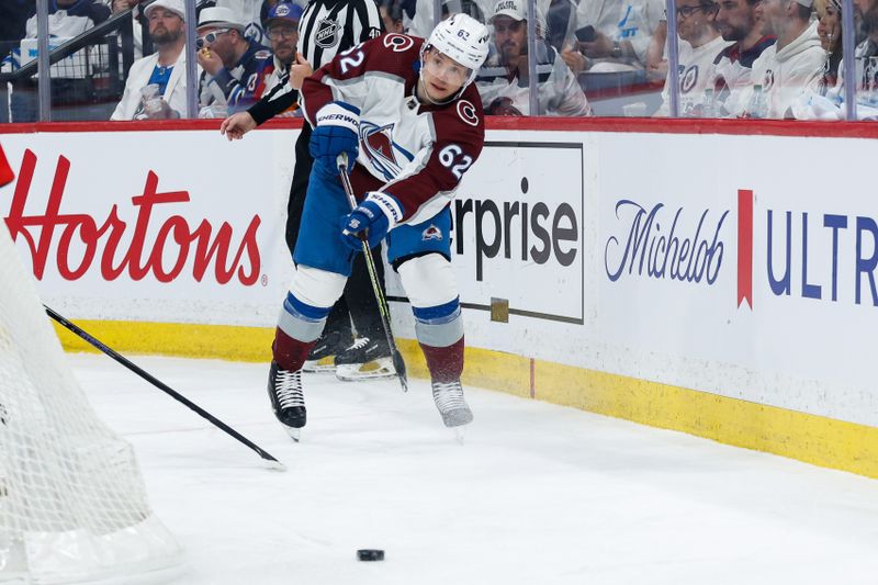 Apr 23, 2024; Winnipeg, Manitoba, CAN; Colorado Avalanche forward Artturi Lehkonen (62) makes a pass against the Winnipeg Jets during the first period in game two of the first round of the 2024 Stanley Cup Playoffs at Canada Life Centre. Mandatory Credit: Terrence Lee-USA TODAY Sports