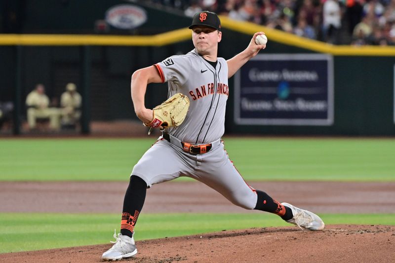 Jun 4, 2024; Phoenix, Arizona, USA;  San Francisco Giants pitcher Kyle Harrison (45) throws in the first inning against the Arizona Diamondbacks at Chase Field. Mandatory Credit: Matt Kartozian-USA TODAY Sports