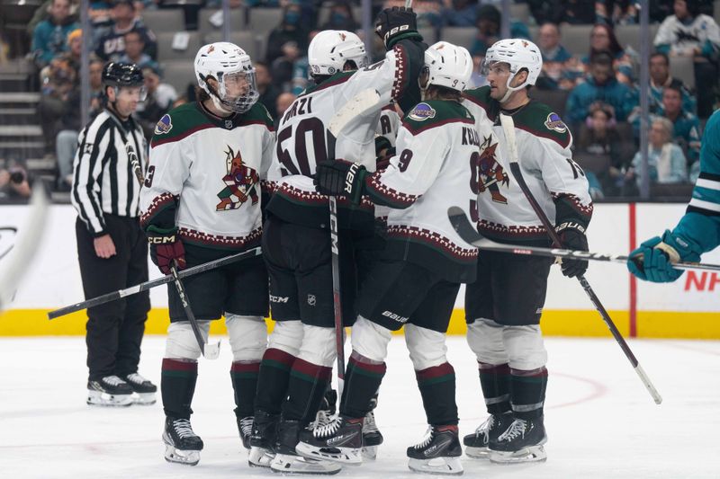 Dec 21, 2023; San Jose, California, USA; Arizona Coyotes defenseman Sean Durzi (50) celebrates with his teammates during the third period against the San Jose Sharks at SAP Center at San Jose. Mandatory Credit: Stan Szeto-USA TODAY Sports