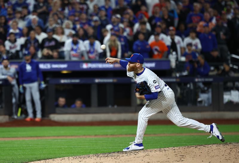 Oct 18, 2024; New York City, New York, USA; 
New York Mets pitcher Reed Garrett (75) throws during the fourth inning against the Los Angeles Dodgers during game five of the NLCS for the 2024 MLB playoffs at Citi Field. Mandatory Credit: Vincent Carchietta-Imagn Images