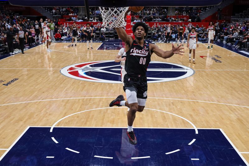 WASHINGTON, DC - FEBRUARY 26: Scoot Henderson #00 of the Portland Trail Blazers dunks the ball against the Washington Wizards during the first half at Capital One Arena on February 26, 2025 in Washington, DC. NOTE TO USER: User expressly acknowledges and agrees that, by downloading and or using this photograph, User is consenting to the terms and conditions of the Getty Images License Agreement. (Photo by Scott Taetsch/Getty Images)