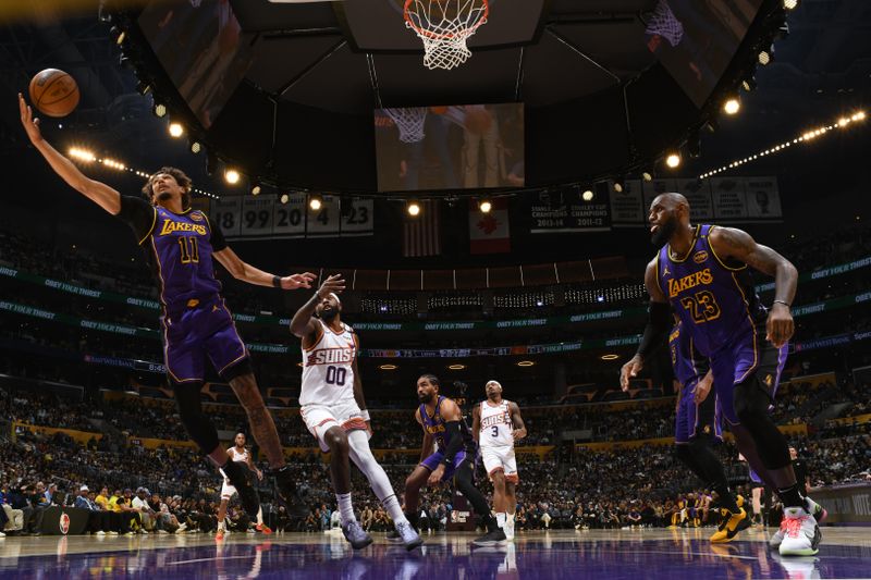 LOS ANGELES, CA - OCTOBER 25: Jaxson Hayes #11 of the Los Angeles Lakers goes up for the rebound during the game against the Los Angeles Lakers on October 25, 2024 at Crypto.Com Arena in Los Angeles, California. NOTE TO USER: User expressly acknowledges and agrees that, by downloading and/or using this Photograph, user is consenting to the terms and conditions of the Getty Images License Agreement. Mandatory Copyright Notice: Copyright 2024 NBAE (Photo by Adam Pantozzi/NBAE via Getty Images)