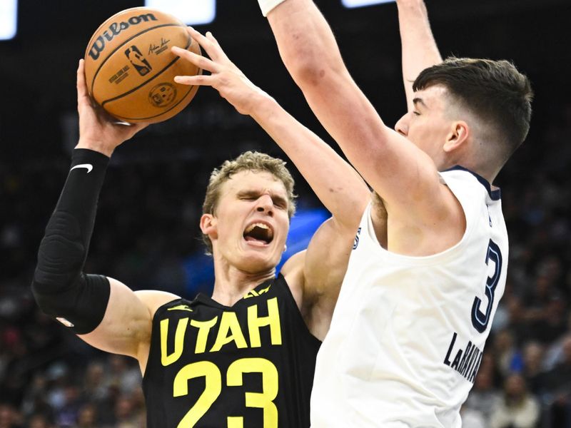 SALT LAKE CITY, UTAH - OCTOBER 23: Lauri Markkanen #23 of the Utah Jazz drives against Jake LaRavia #3 of the Memphis Grizzlies during the second quarter at Delta Center on October 23, 2024 in Salt Lake City, Utah. NOTE TO USER: User expressly acknowledges and agrees that, by downloading and or using this photograph, User is consenting to the terms and conditions of the Getty Images License Agreement. (Photo by Alex Goodlett/Getty Images)