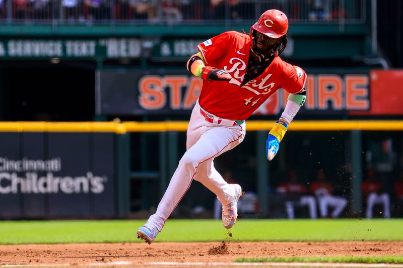 Sep 21, 2024; Cincinnati, Ohio, USA; Cincinnati Reds shortstop Elly De La Cruz (44) scores on a single hit by catcher Tyler Stephenson (not pictured) in the third inning against the Pittsburgh Pirates at Great American Ball Park. Mandatory Credit: Katie Stratman-Imagn Images