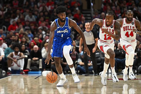 CHICAGO, ILLINOIS - NOVEMBER 15:  Jonathan Isaac #1 of the Orlando Magic controls the ball against the Chicago Bulls on November 15, 2023 at United Center in Chicago, Illinois.   NOTE TO USER: User expressly acknowledges and agrees that, by downloading and or using this photograph, User is consenting to the terms and conditions of the Getty Images License Agreement.  (Photo by Jamie Sabau/Getty Images)