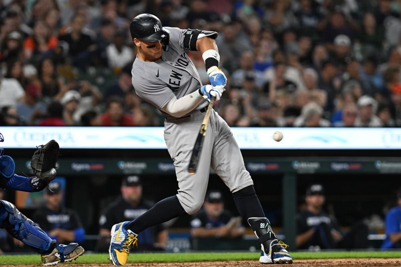 Aug 16, 2024; Detroit, Michigan, USA;  New York Yankees center fielder Aaron Judge (99) hits a solo home run against the Detroit Tigers in the eighth inning at Comerica Park. Mandatory Credit: Lon Horwedel-USA TODAY Sports