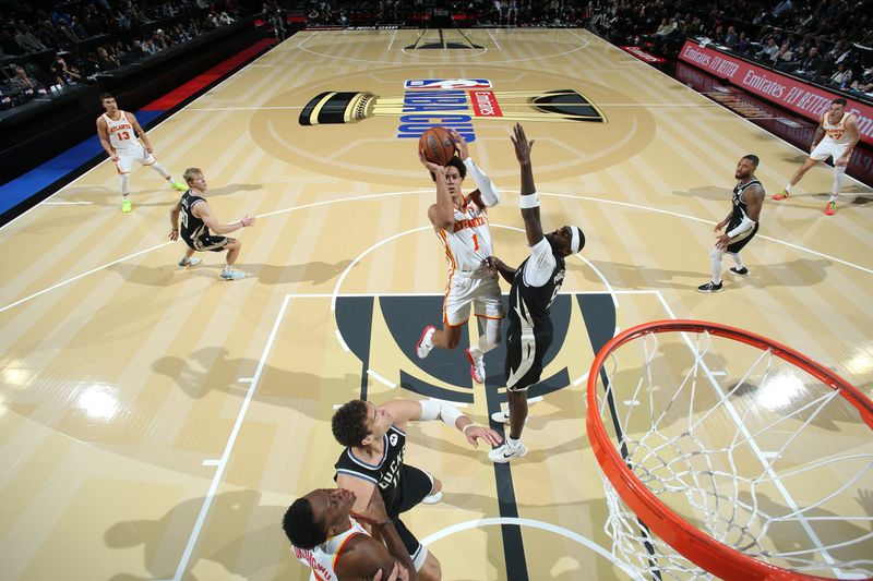 LAS VEGAS, NV - DECEMBER 14: Jalen Johnson #1 of the Atlanta Hawks shoots the ball during the game against the Milwaukee Bucks during the Emirates NBA Cup Semifinal game on December 14, 2024 at T-Mobile Arena in Las Vegas, Nevada. NOTE TO USER: User expressly acknowledges and agrees that, by downloading and/or using this Photograph, user is consenting to the terms and conditions of the Getty Images License Agreement. Mandatory Copyright Notice: Copyright 2024 NBAE (Photo by Nathaniel S. Butler/NBAE via Getty Images)