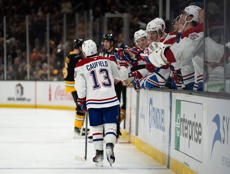 Dec 1, 2024; Boston, Massachusetts, USA;  Montreal Canadiens right wing Cole Caufield (13) celebrates a goal against the Boston Bruins during the second period of a game at the TD Garden. Mandatory Credit: Natalie Reid-Imagn Images