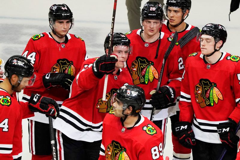 Apr 13, 2023; Chicago, Illinois, USA; Chicago Blackhawks center Jonathan Toews (19) is honored after the game against the Philadelphia Flyers. He played his last game as a Blackhawk, at United Center. Mandatory Credit: David Banks-USA TODAY Sports