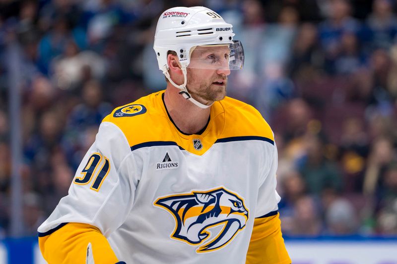 Nov 17, 2024; Vancouver, British Columbia, CAN; Nashville Predators forward Steven Stamkos (91) during a stop in play against the Vancouver Canucks in the second period at Rogers Arena. Mandatory Credit: Bob Frid-Imagn Images