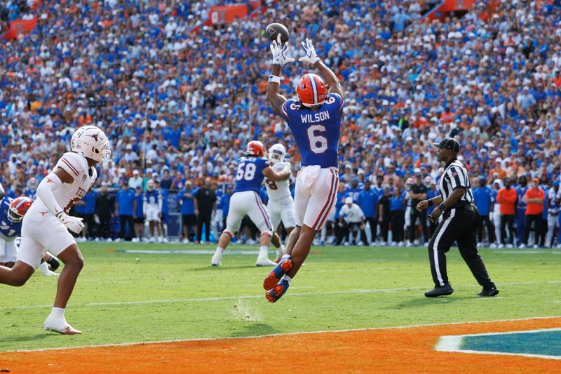 Oct 4, 2025; Gainesville, Florida, USA; Florida Gators wide receiver Dallas Wilson (6) makes a catch for a touchdown against the Texas Longhorns during the first half at Ben Hill Griffin Stadium. Mandatory Credit: Matt Pendleton-Imagn Images