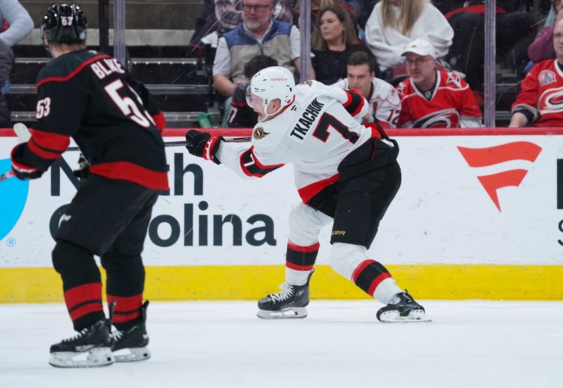 Nov 16, 2024; Raleigh, North Carolina, USA;  Ottawa Senators left wing Brady Tkachuk (7) takes shoot against the Carolina Hurricanes during the third period at Lenovo Center. Mandatory Credit: James Guillory-Imagn Images