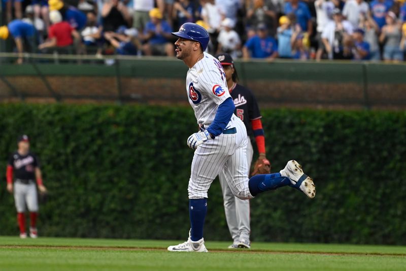 Jul 19, 2023; Chicago, Illinois, USA; Chicago Cubs center fielder Mike Tauchman (40) rounds the bases after hitting a home run against the Washington Nationals during the first inning at Wrigley Field. Mandatory Credit: Matt Marton-USA TODAY Sports