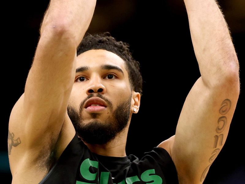 BOSTON, MASSACHUSETTS - MAY 14: Jayson Tatum #0 of the Boston Celtics warms up prior to game seven of the 2023 NBA Playoffs Eastern Conference Semifinals against the Philadelphia 76ers at TD Garden on May 14, 2023 in Boston, Massachusetts. NOTE TO USER: User expressly acknowledges and agrees that, by downloading and or using this photograph, User is consenting to the terms and conditions of the Getty Images License Agreement. (Photo by Adam Glanzman/Getty Images)